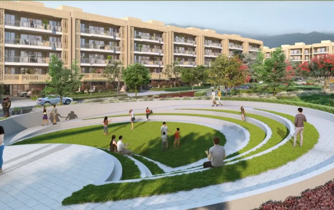 Low-rise luxury residences at The Valley Orchard by DLF in Panchkula, featuring landscaped green spaces, curved pedestrian pathways, and outdoor seating areas designed for family living within the wider DLF Valley community